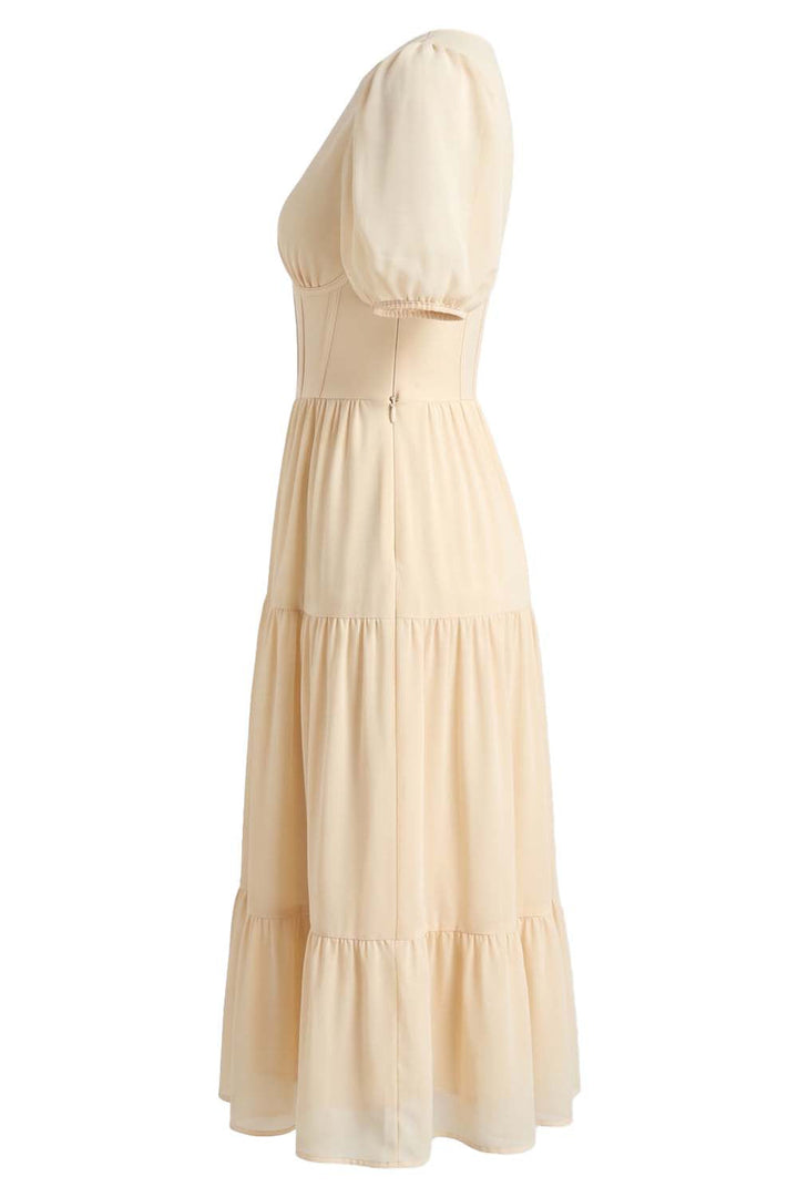 ELOISE puff sleeve corset midi dress in cream on model - side view