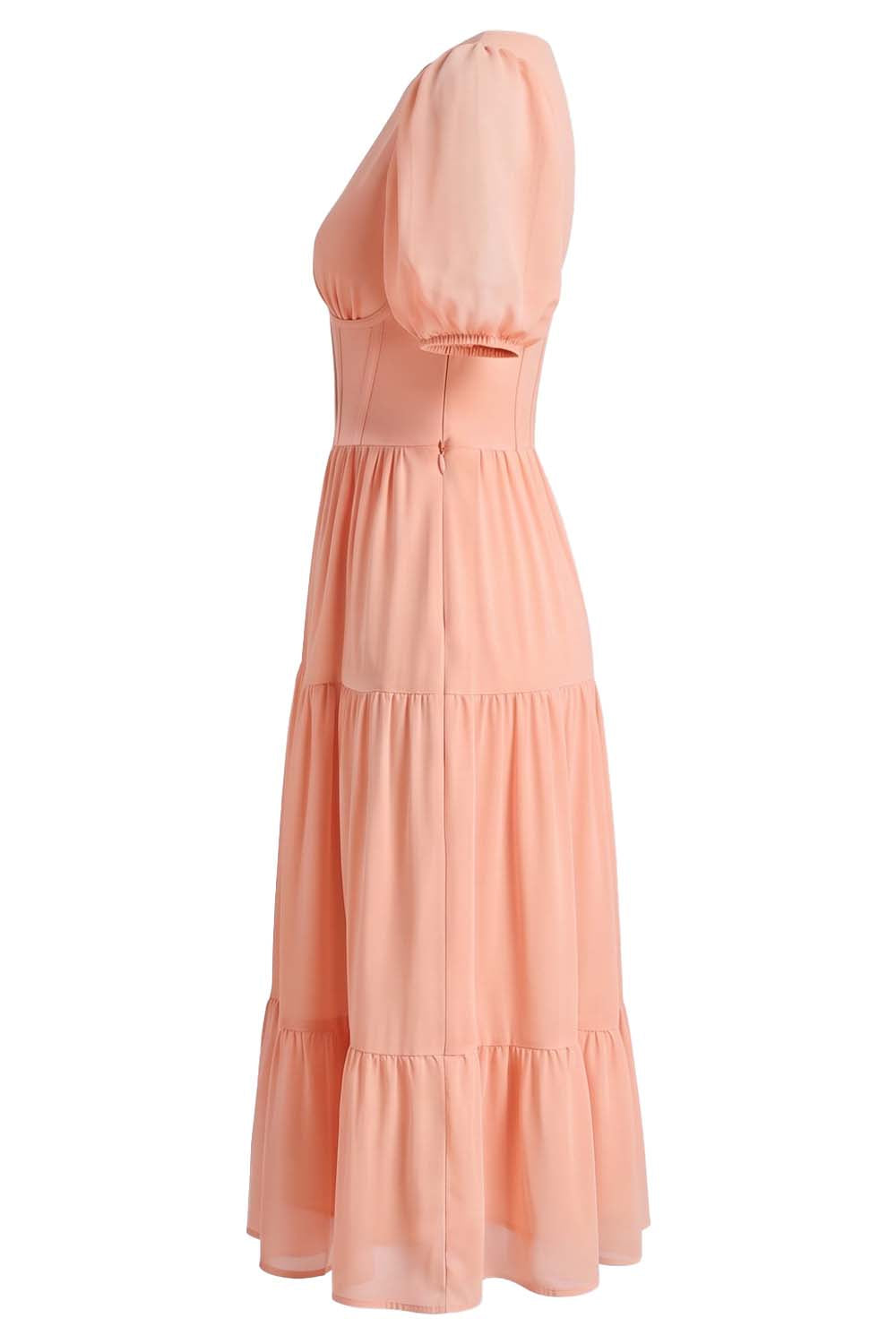 ELOISE puff sleeve corset midi dress in peach blush on model - side view