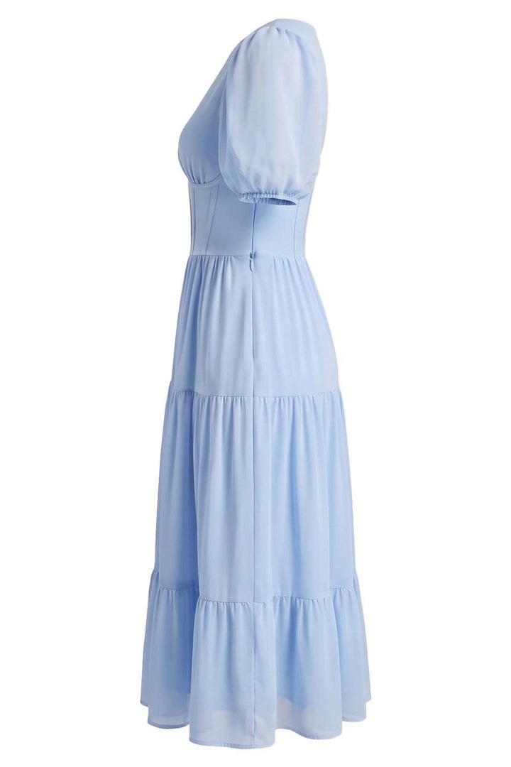 ELOISE puff sleeve corset midi dress in powder blue on model - side view