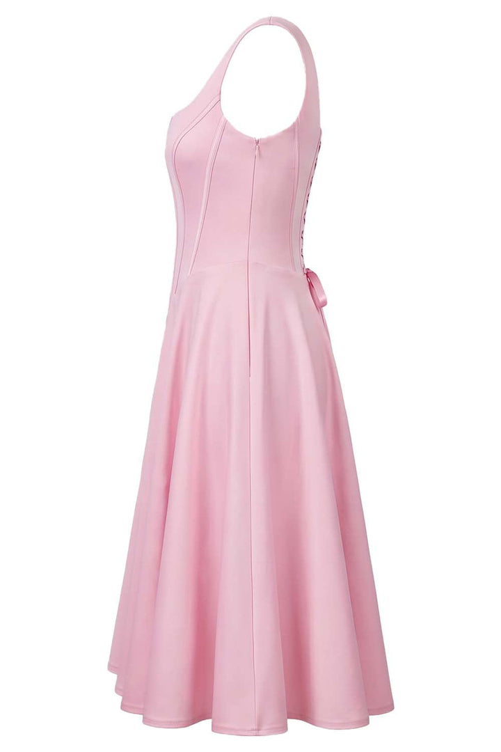 MIRABELLE corset sundress in baby pink on model - side view