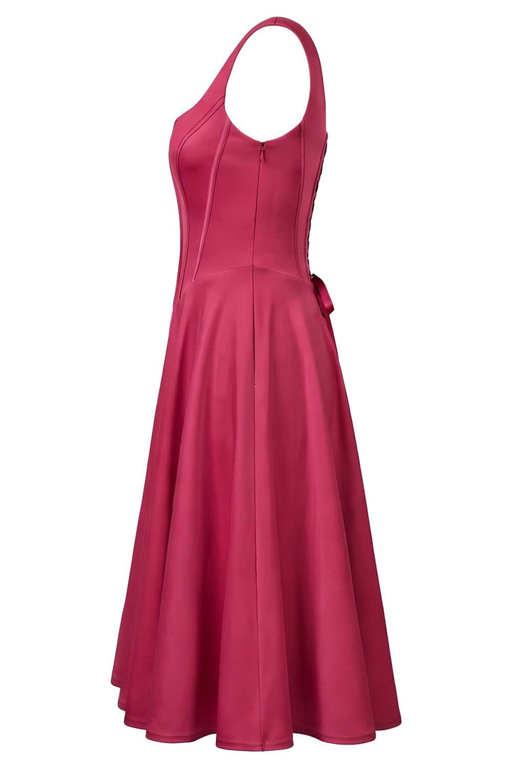 MIRABELLE corset sundress in deep raspberry on model - side view