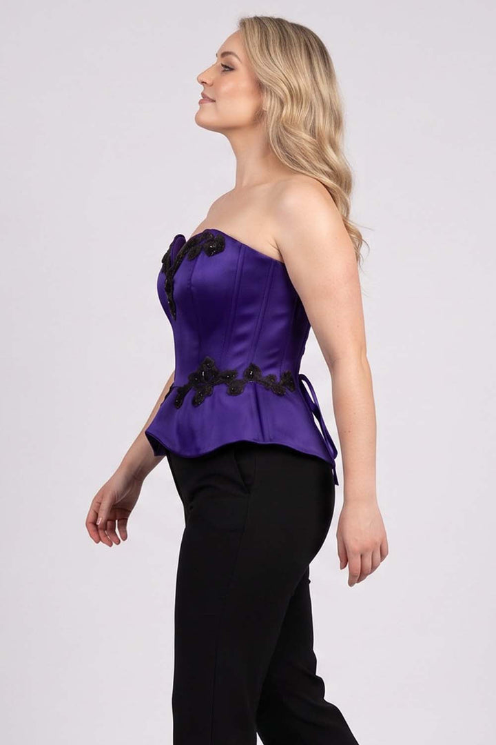 ODETTE Beaded Peplum Overbust Corset in Royal Purple on model – side view