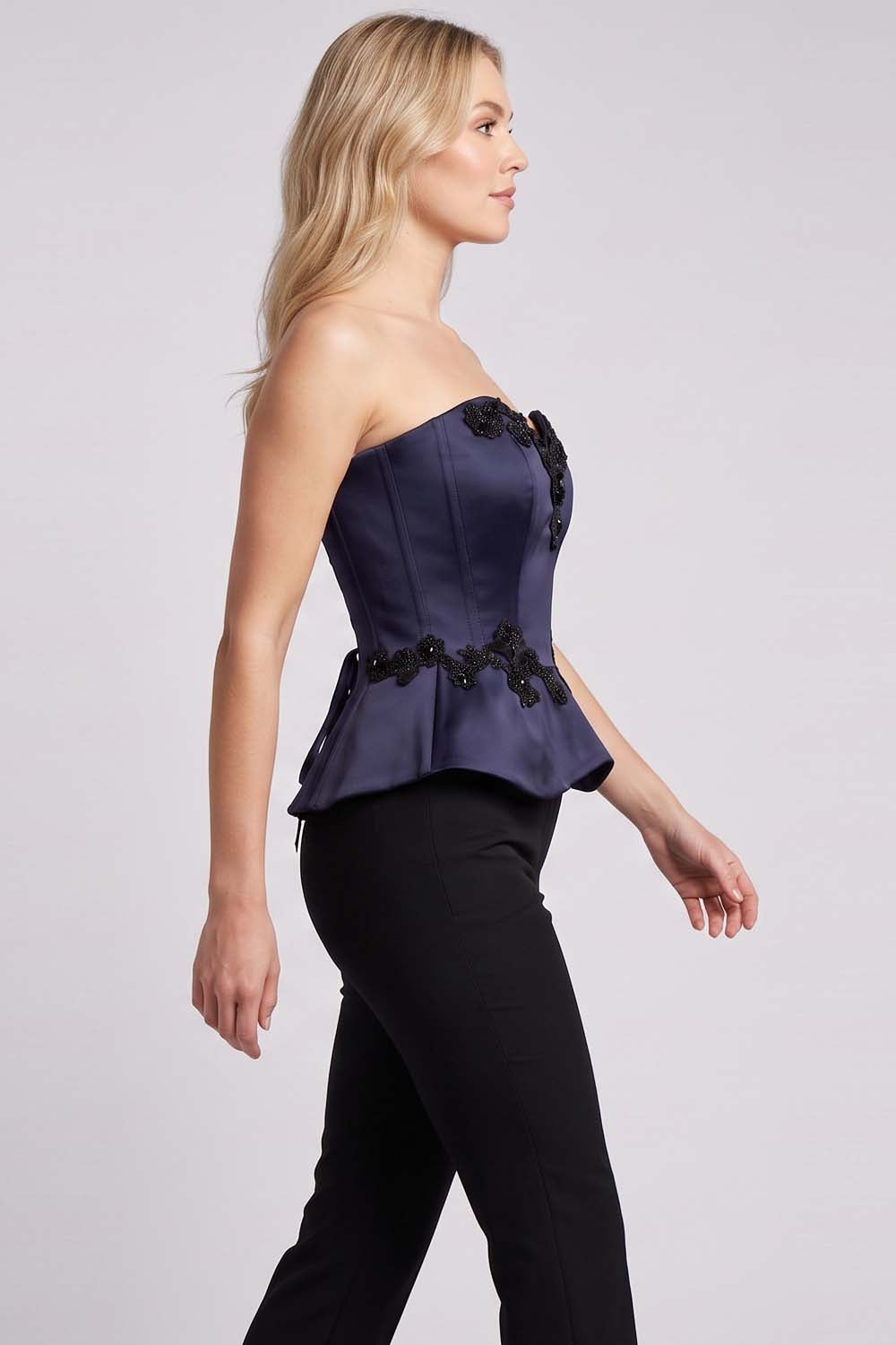 ODETTE Beaded Peplum Overbust Corset in Navy on model – side view