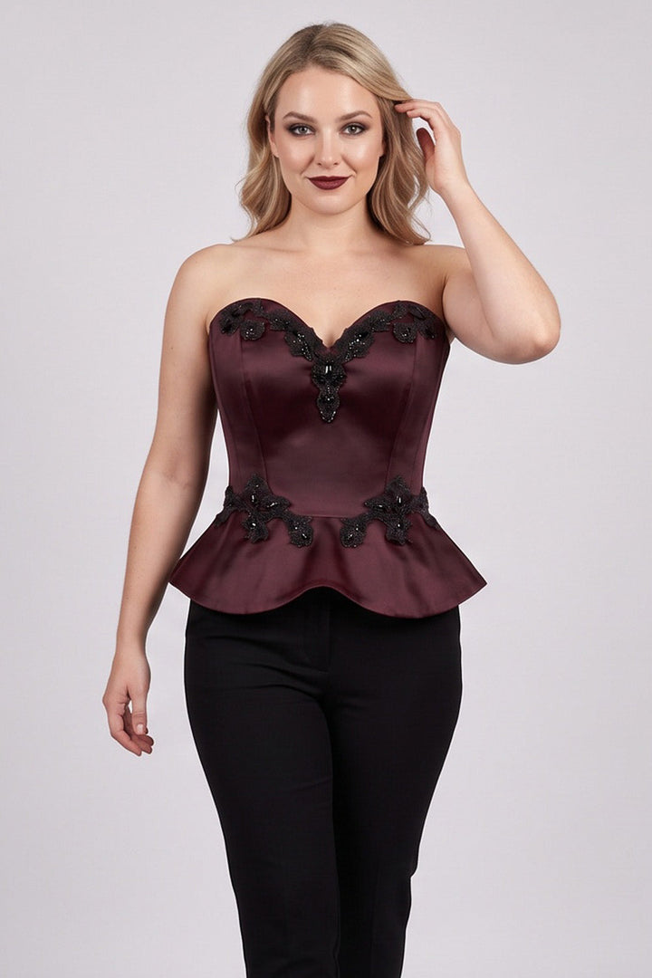 ODETTE Beaded Peplum Overbust Corset in Maroon on model – front view