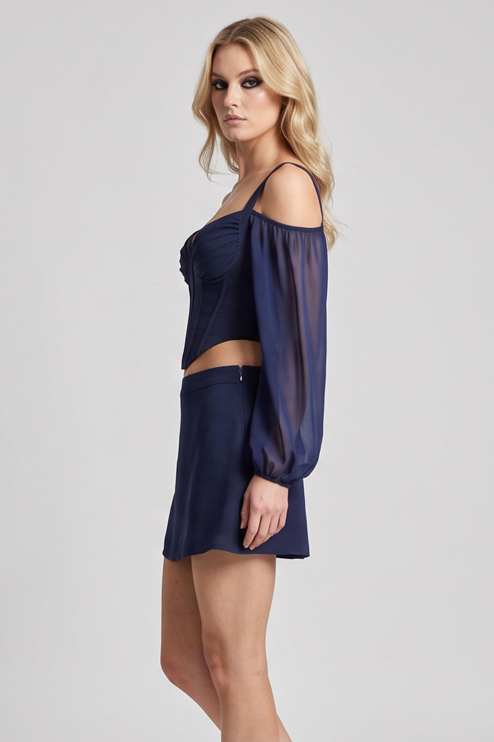 MAEVE Corset Top &amp; Mini Skirt Co-ord Set in Navy on model – side view