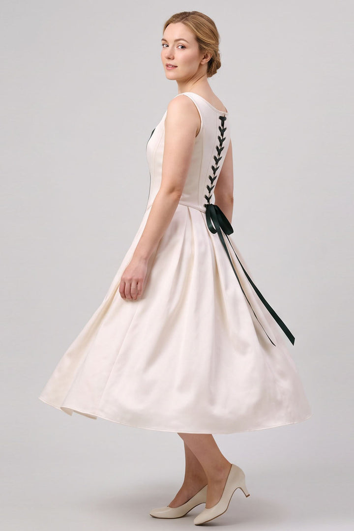 MARLY Rococo Corset Tea Dress in Ivory / Forest Green on model – side view