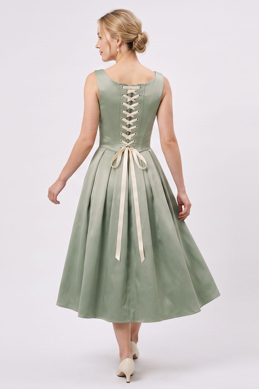 MARLY Rococo Corset Tea Dress in Pale Sage Mint / Cream on model – back view
