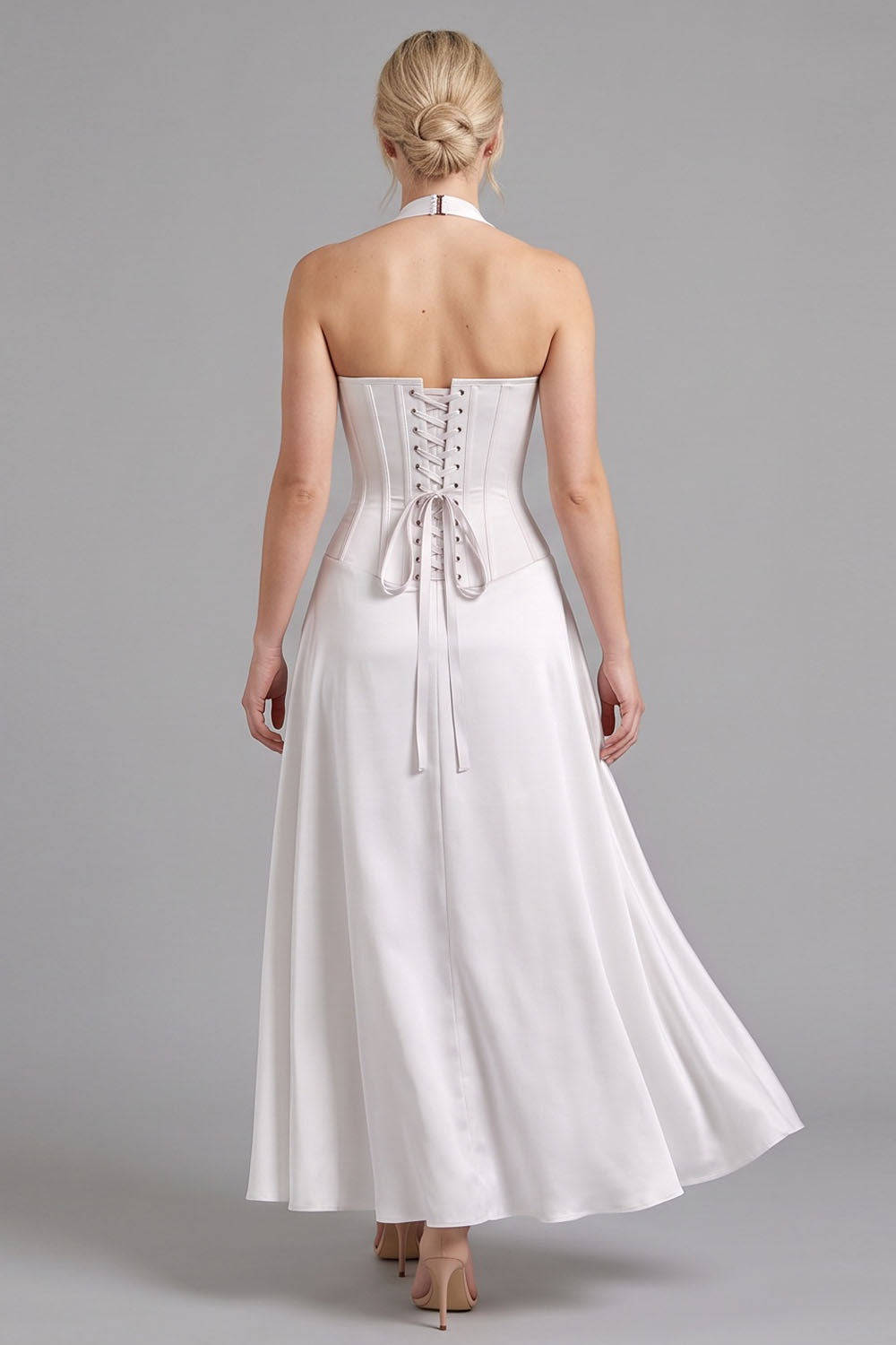 LENORE Halter Corset Maxi Dress in Ivory on model — back view