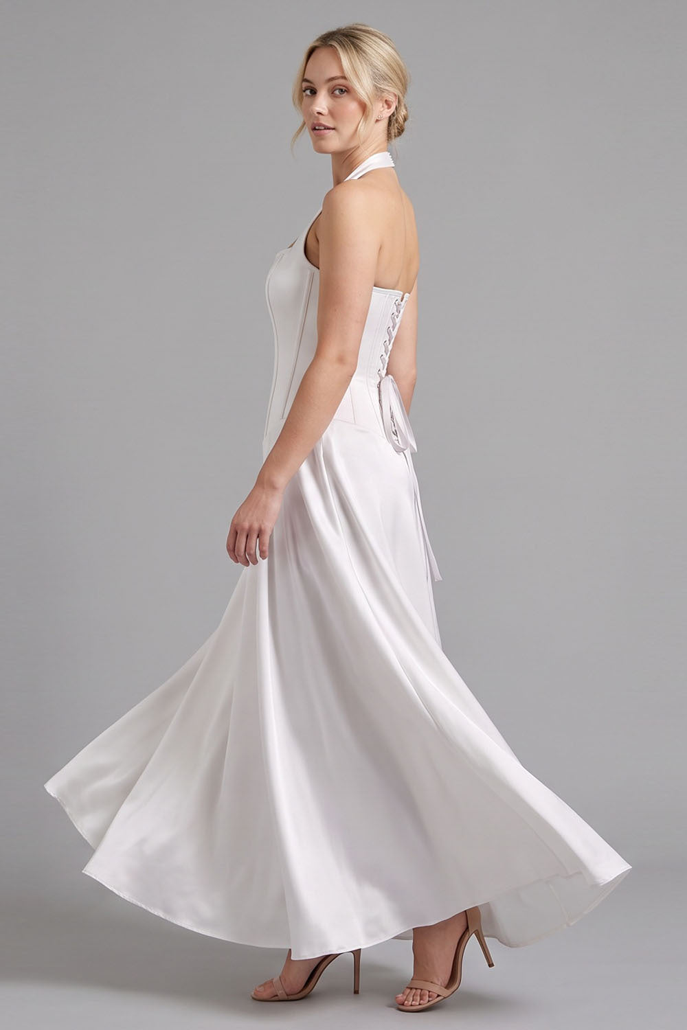 LENORE Halter Corset Maxi Dress in Ivory on model — side view
