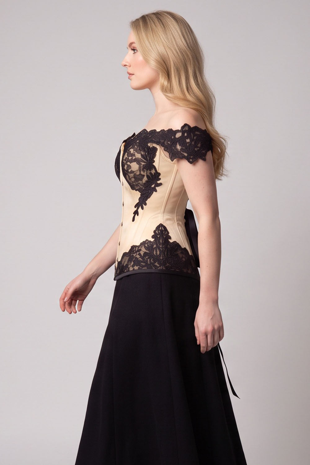 OPHELIA Off—Shoulder Overbust Corset in Jet Black on model — side view